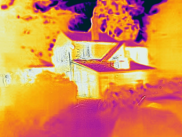 A thermal image of one of the building of the Wolfson site, captured at distance to show the whole side of the building