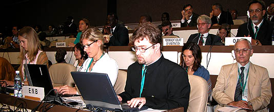 ENB team members (left -right): Dagmar Lohan, Lisa Schipper, Richard Sherman, Karen Alvarenga and Andrey Vavilov at the 6th Conference of the Parties of the United Nations Convention to Combat Desertification, Havana, Cuba, Sept, 2003. 