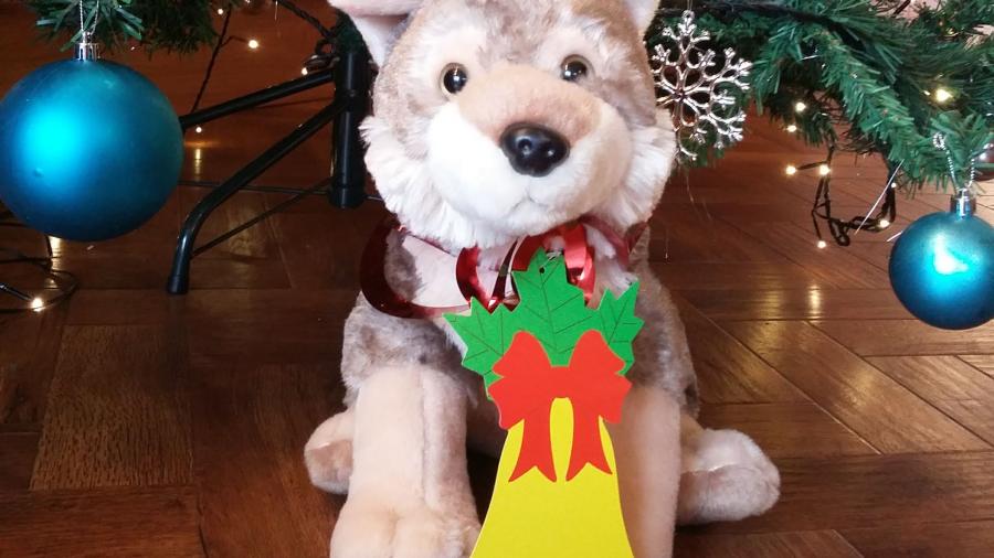 Virginia the toy wolf under the Christmas tree