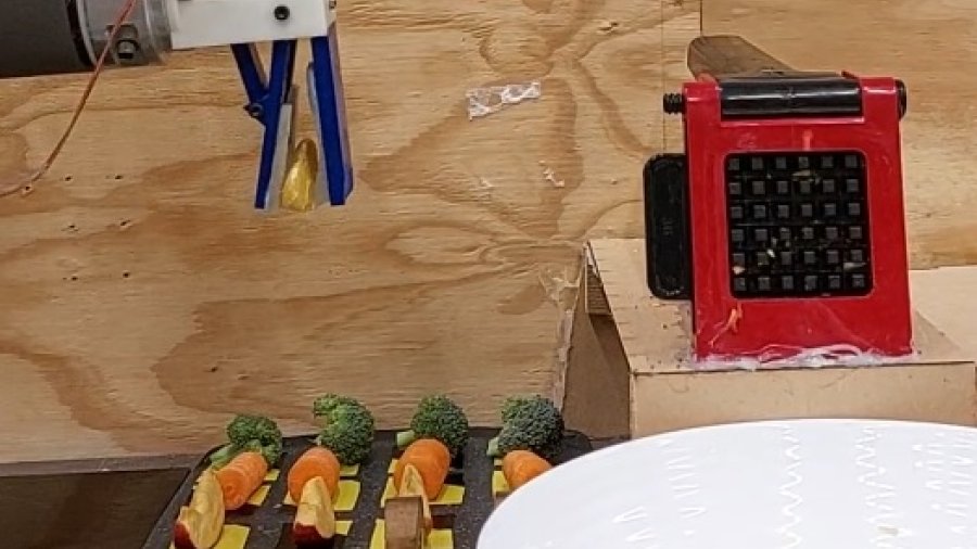 Robot chef making a dish