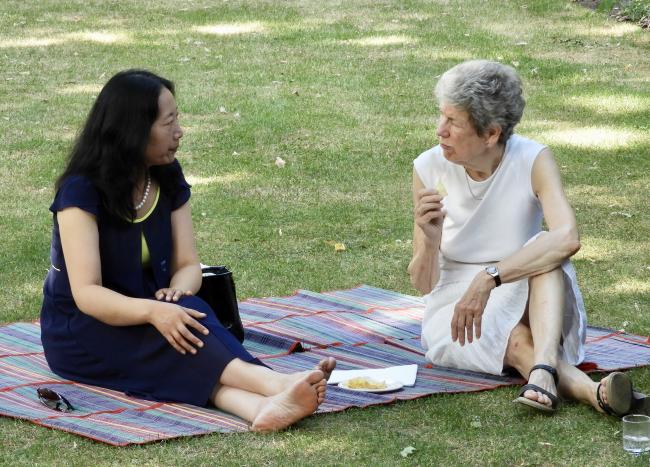 CRA garden party 2018, two women having a picnic