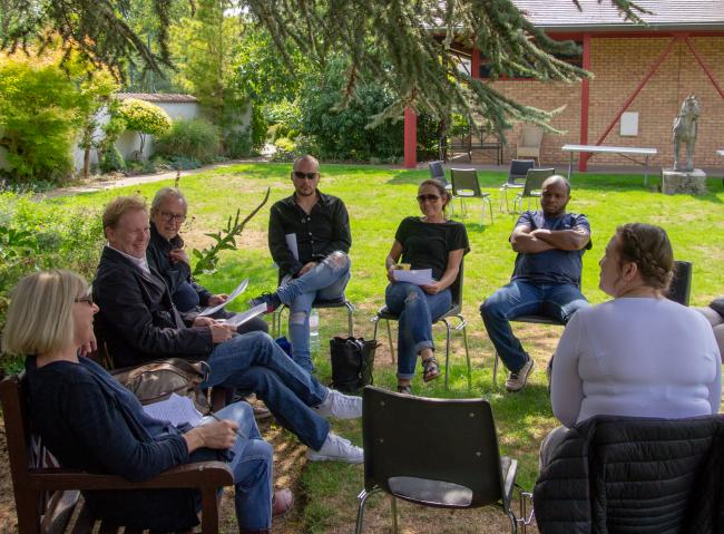 Dr Michael Hrebeniak takes a Creative Writing workshop into the garden
