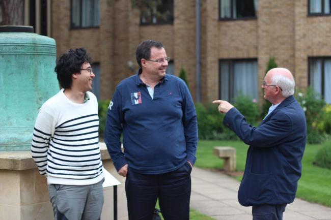 Professor John Naughton (right) and Press Fellow Evan Fowler (left) chat with BBC News business correspondent Jonty Bloom after a Friday seminar.