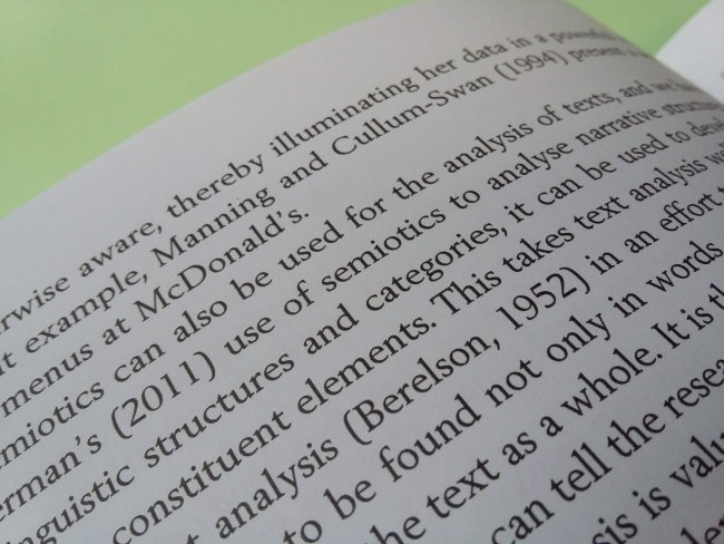 close-up of book showing in-text references