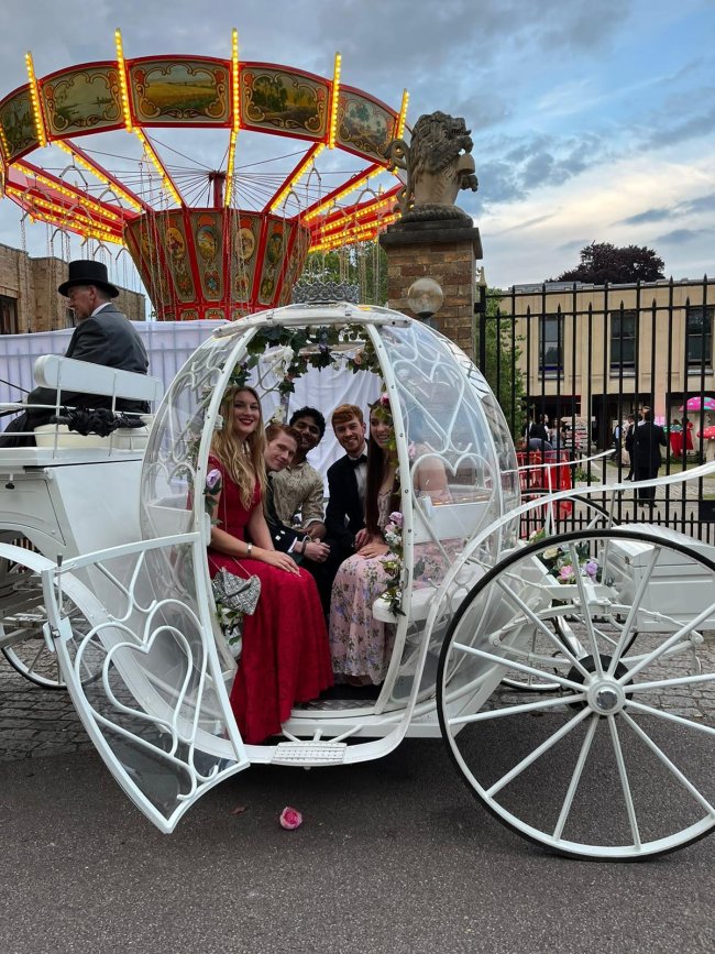 arriving in style to Wolfson's fairytale-themed may ball